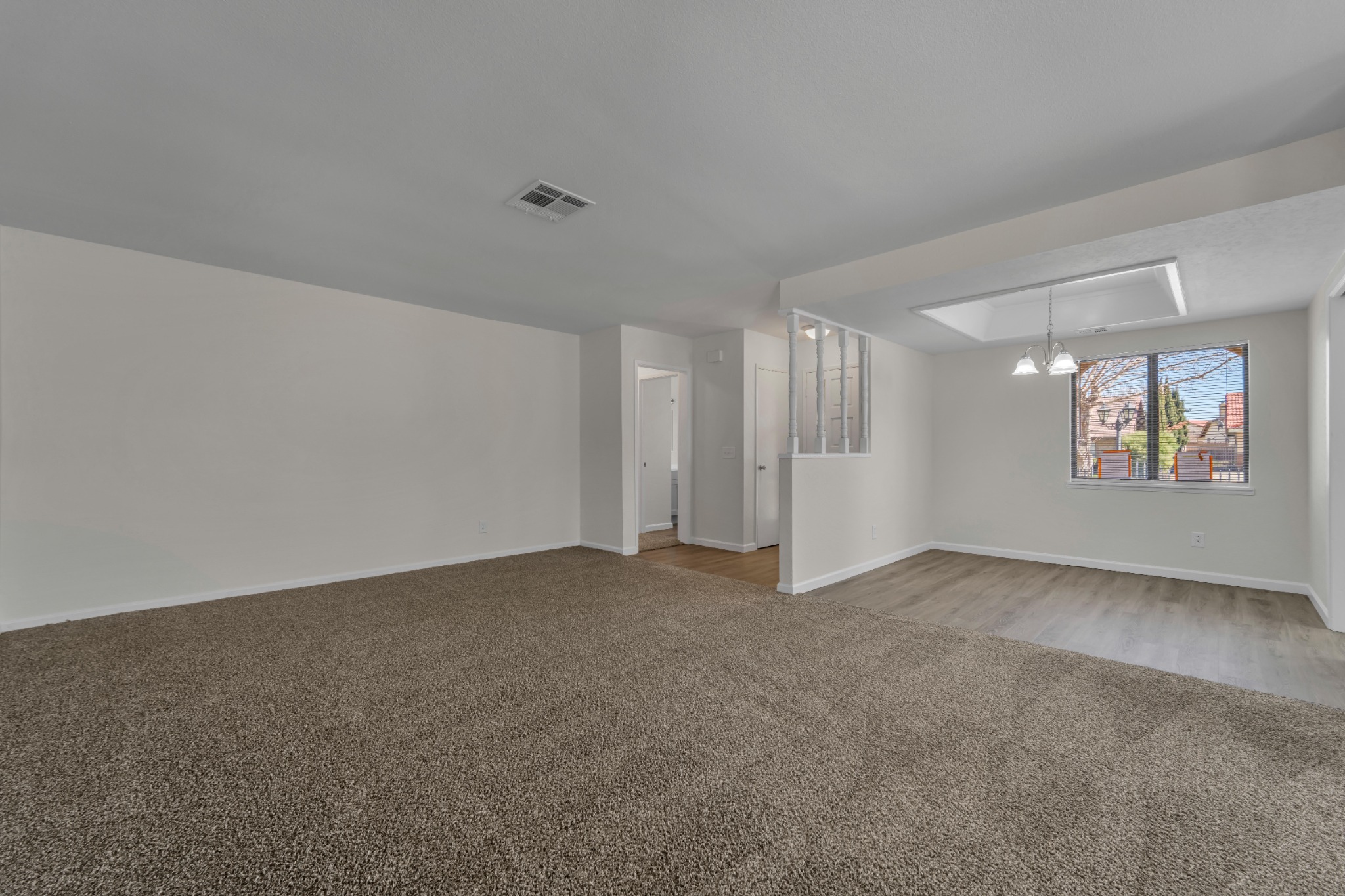Living and dining areas at 42865 Normandy Lane